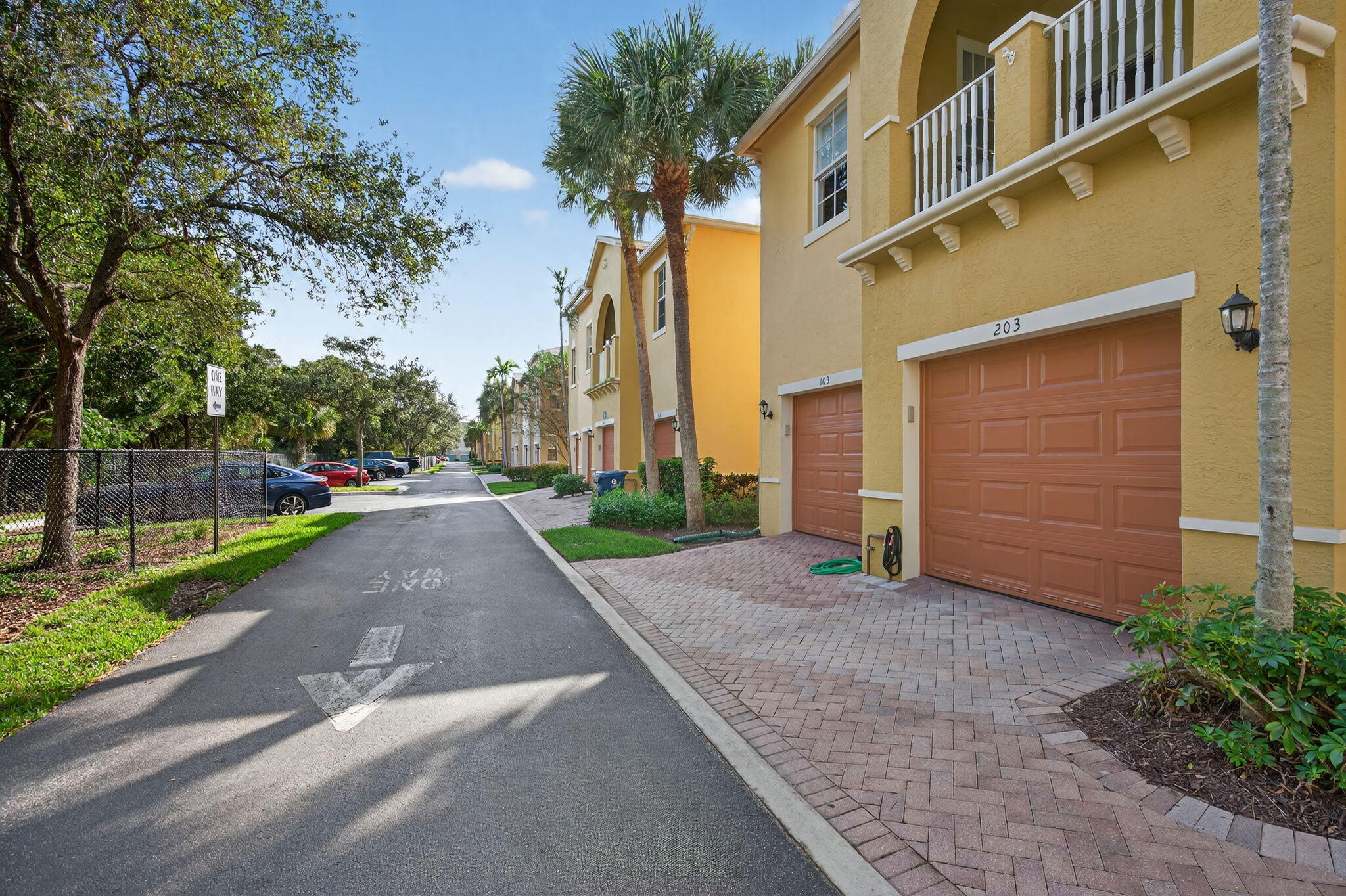 141 Seagrape Drive, Unit 203 Jupiter, FL 33458 - Photo 32 of 39 Rear view of condo-rear driveway