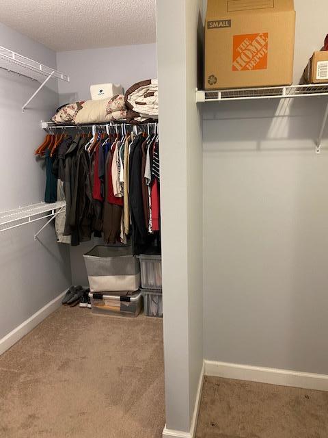 22 3rd Street Shalimar, FL 32579 - Photo 13 of 40 a view of walk in closet with clothes