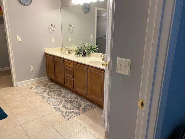 22 3rd Street Shalimar, FL 32579 - Photo 17 of 40 a spacious bathroom with a sink and a mirror