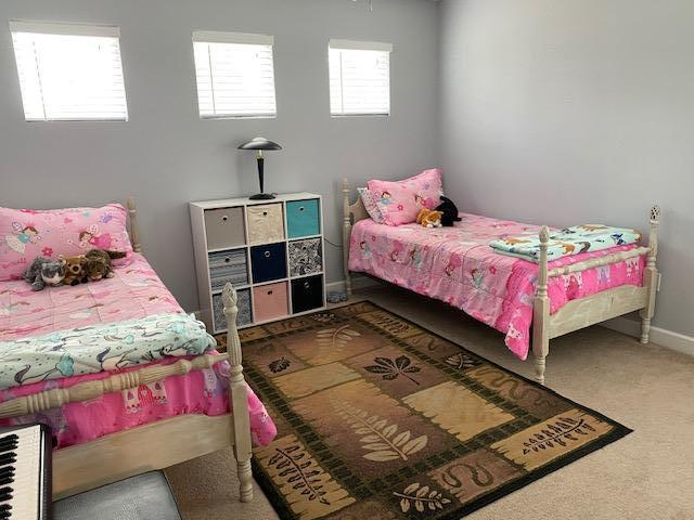 22 3rd Street Shalimar, FL 32579 - Photo 19 of 40 a bedroom with a bed and a window