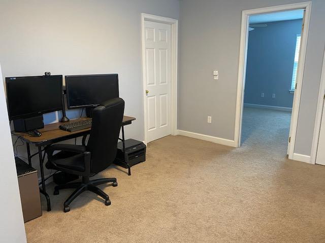 22 3rd Street Shalimar, FL 32579 - Photo 21 of 40 a view of workspace with hardwood wall
