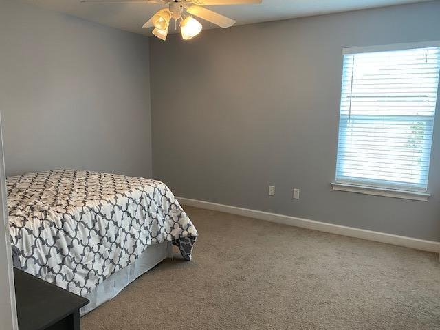 22 3rd Street Shalimar, FL 32579 - Photo 22 of 40 a bedroom with a bed and a window