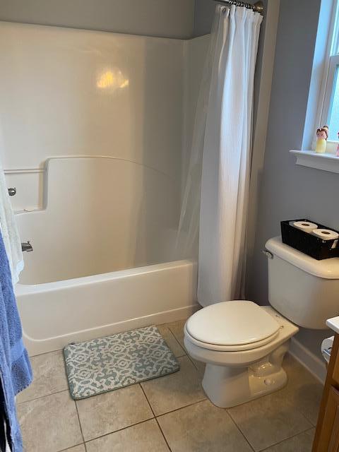 22 3rd Street Shalimar, FL 32579 - Photo 27 of 40 a white toilet sitting next to a bath tub