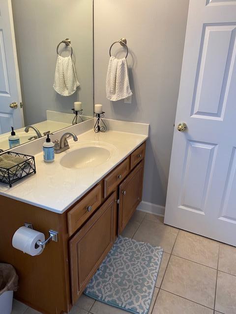 22 3rd Street Shalimar, FL 32579 - Photo 28 of 40 a bathroom with a sink vanity and mirror