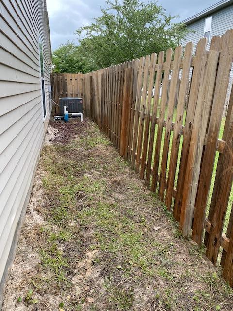 22 3rd Street Shalimar, FL 32579 - Photo 40 of 40 a view of a backyard with wooden fence
