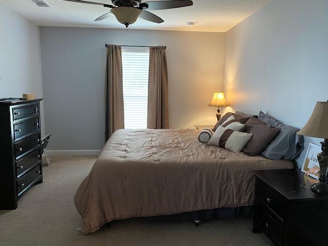 22 3rd Street Shalimar, FL 32579 - Photo 10 of 40 a bedroom with a bed and a window