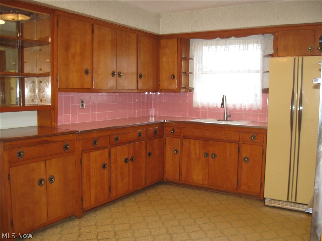 6154 State Road Parma, OH 44134 - Photo 3 of 35 Large kitchen with ample food prep space and double sink.