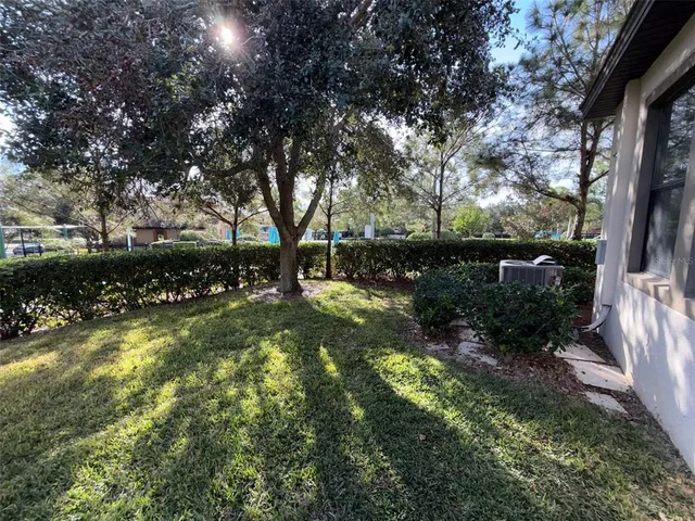 a view of backyard with green space