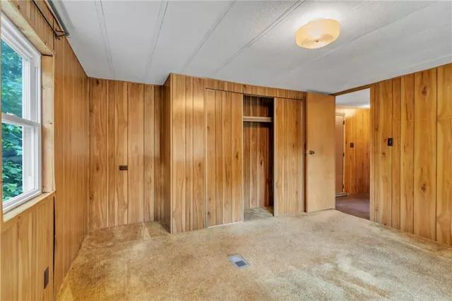 a view of entryway with a front door