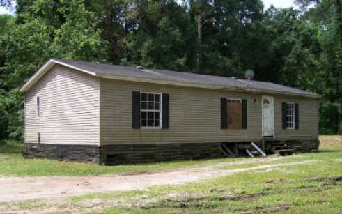 45485 Kilpatrick Road Callahan, FL 32011 - Photo 1 of 1 a front view of house with yard