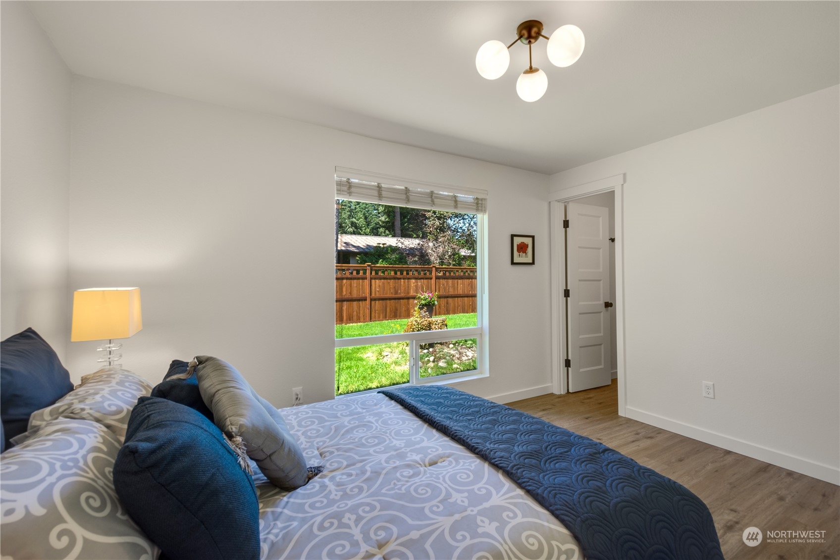 14545 166th Place Southeast Renton, WA 98059 - Photo 14 of 28 a bedroom with a bed and a window