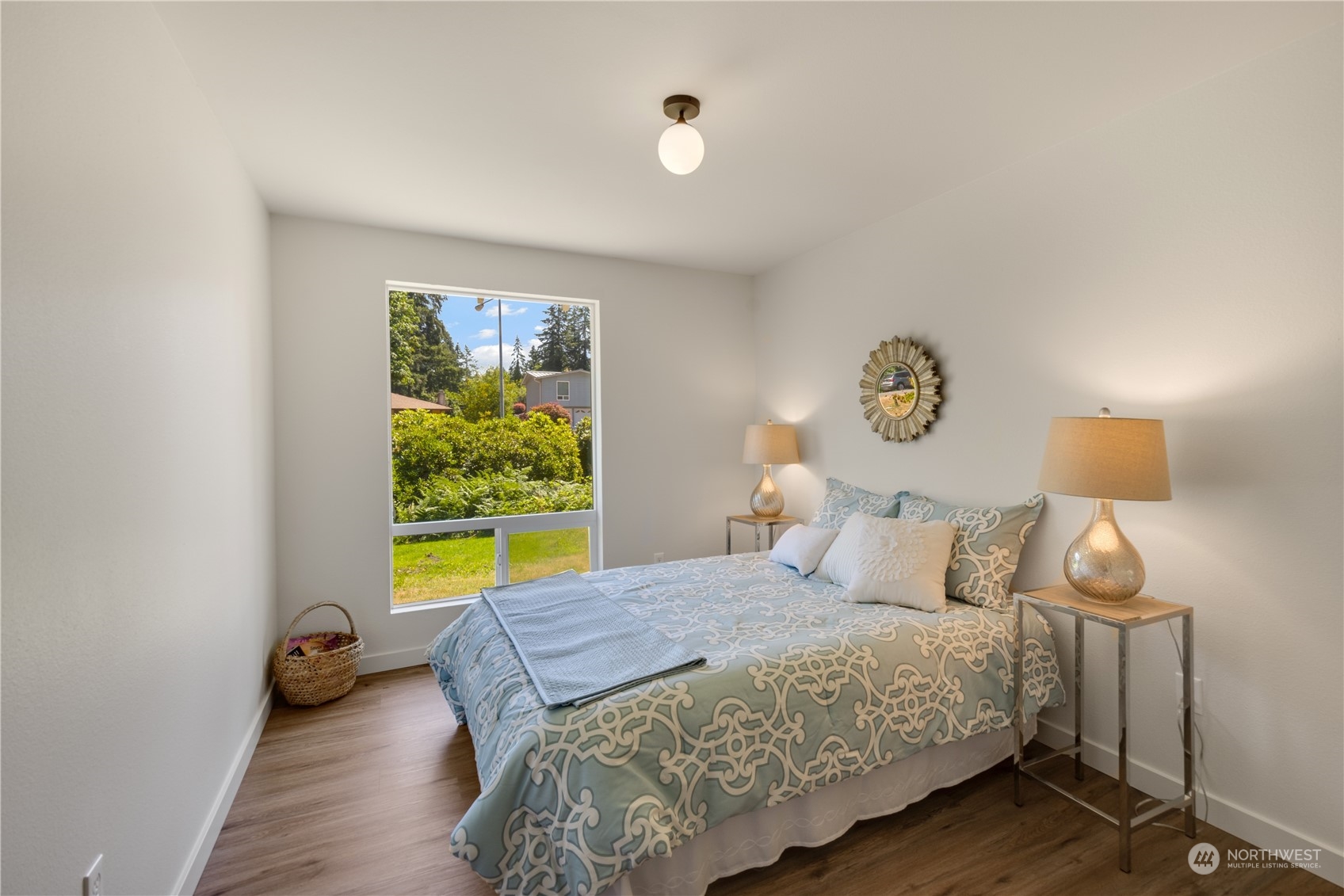 14545 166th Place Southeast Renton, WA 98059 - Photo 17 of 28 a bedroom with a bed and a window