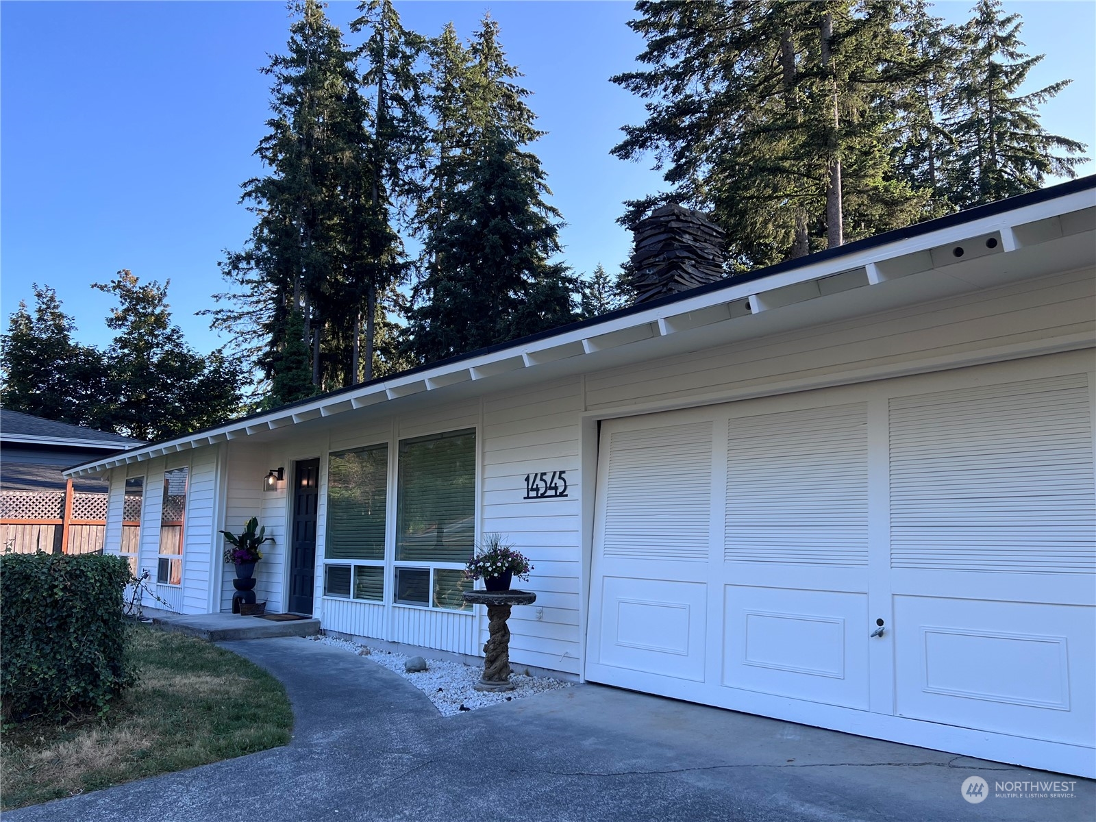 14545 166th Place Southeast Renton, WA 98059 - Photo 2 of 28 a view of a house with backyard and garden