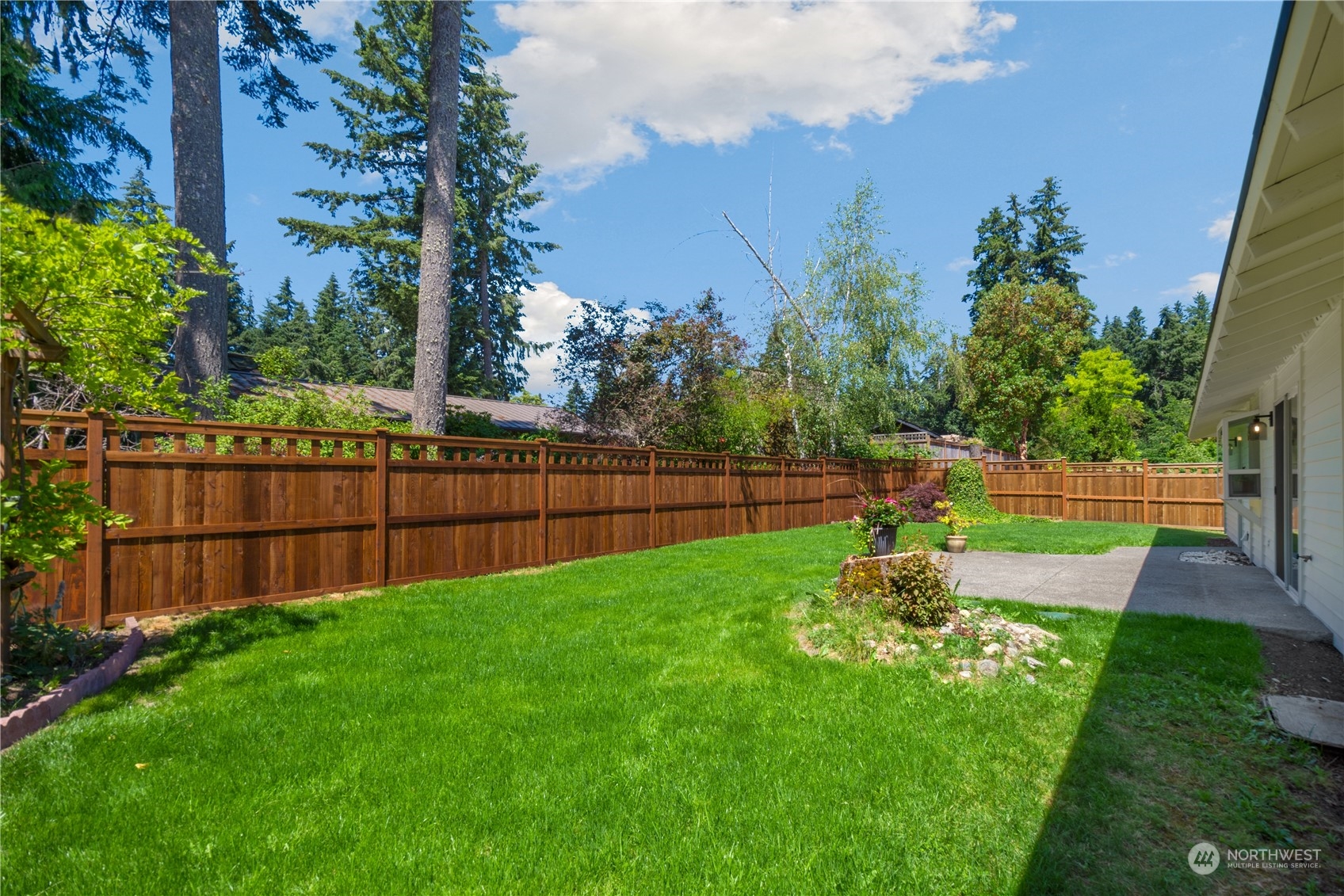 14545 166th Place Southeast Renton, WA 98059 - Photo 25 of 28 a view of a yard with a slide