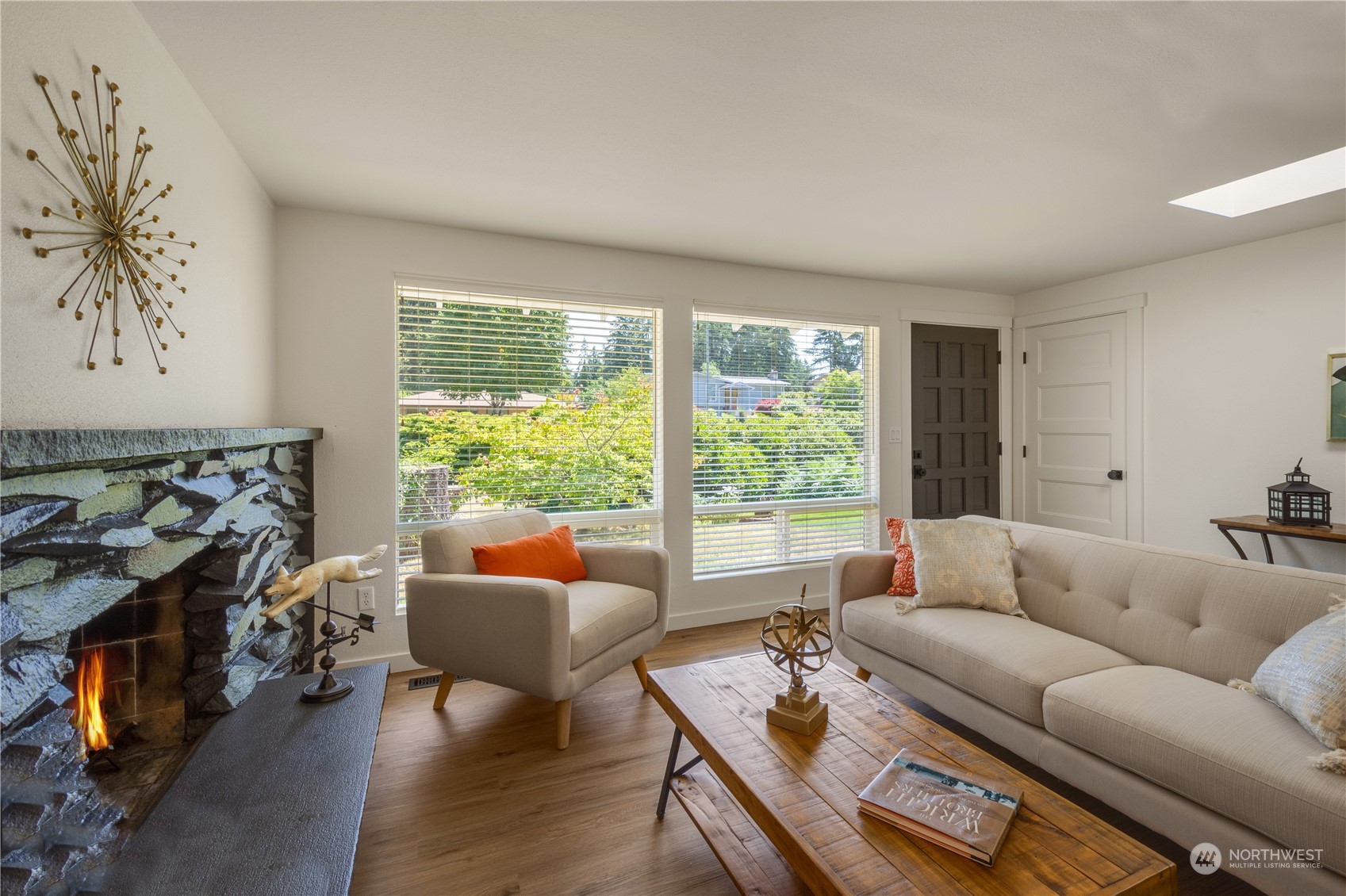 14545 166th Place Southeast Renton, WA 98059 - Photo 5 of 28 a living room with furniture and a large window