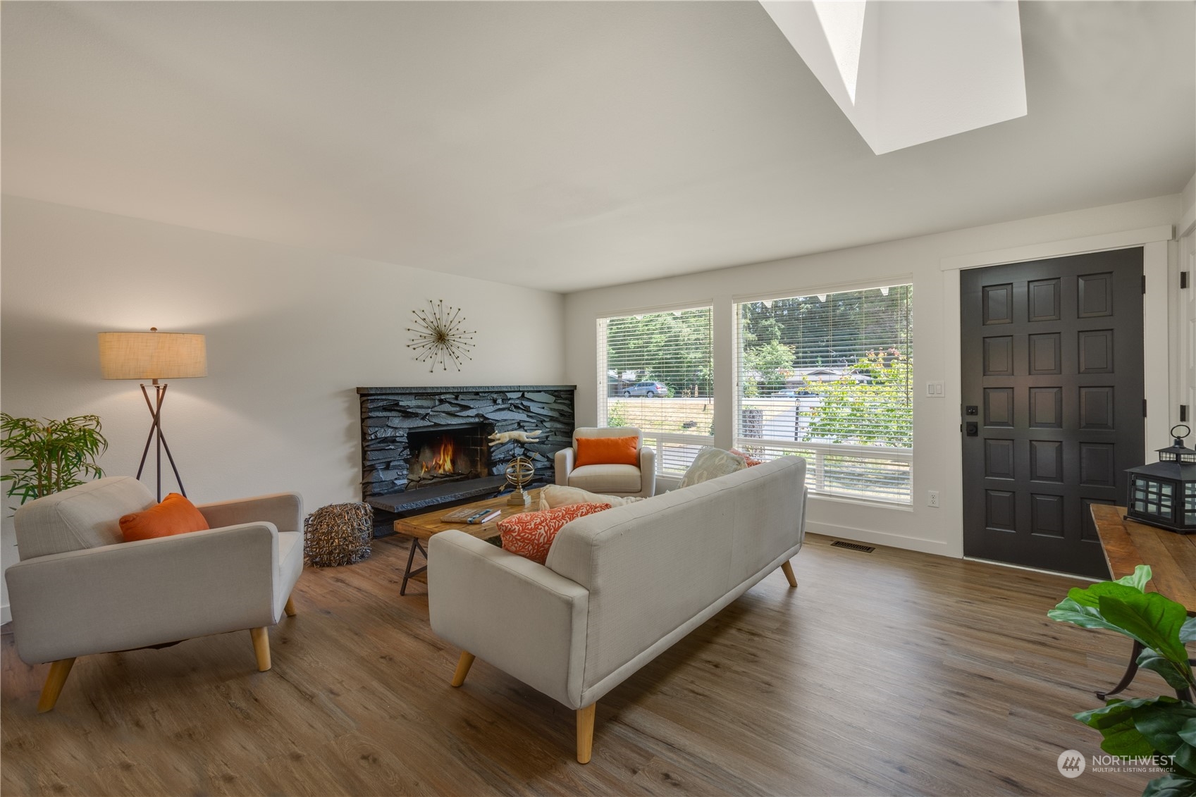 14545 166th Place Southeast Renton, WA 98059 - Photo 6 of 28 a living room with furniture and a fireplace