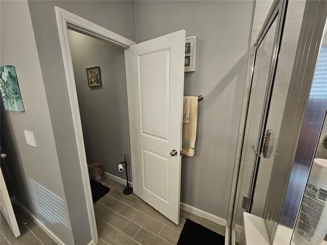 a bathroom with a sink and a shower