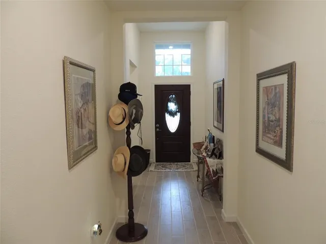 a view of entryway with wooden floor