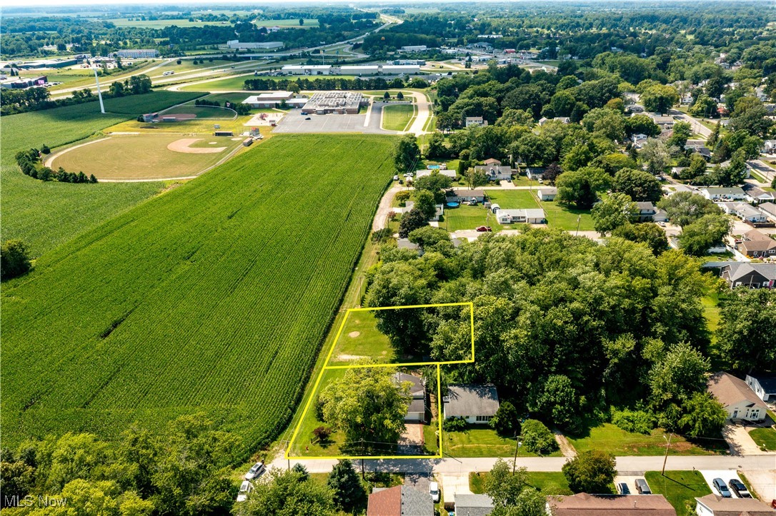 319 Ironwood Road Huron, OH 44839 - Photo 30 of 32 Aerial view of sparsely populated area with rows of crops and property parcel outlined