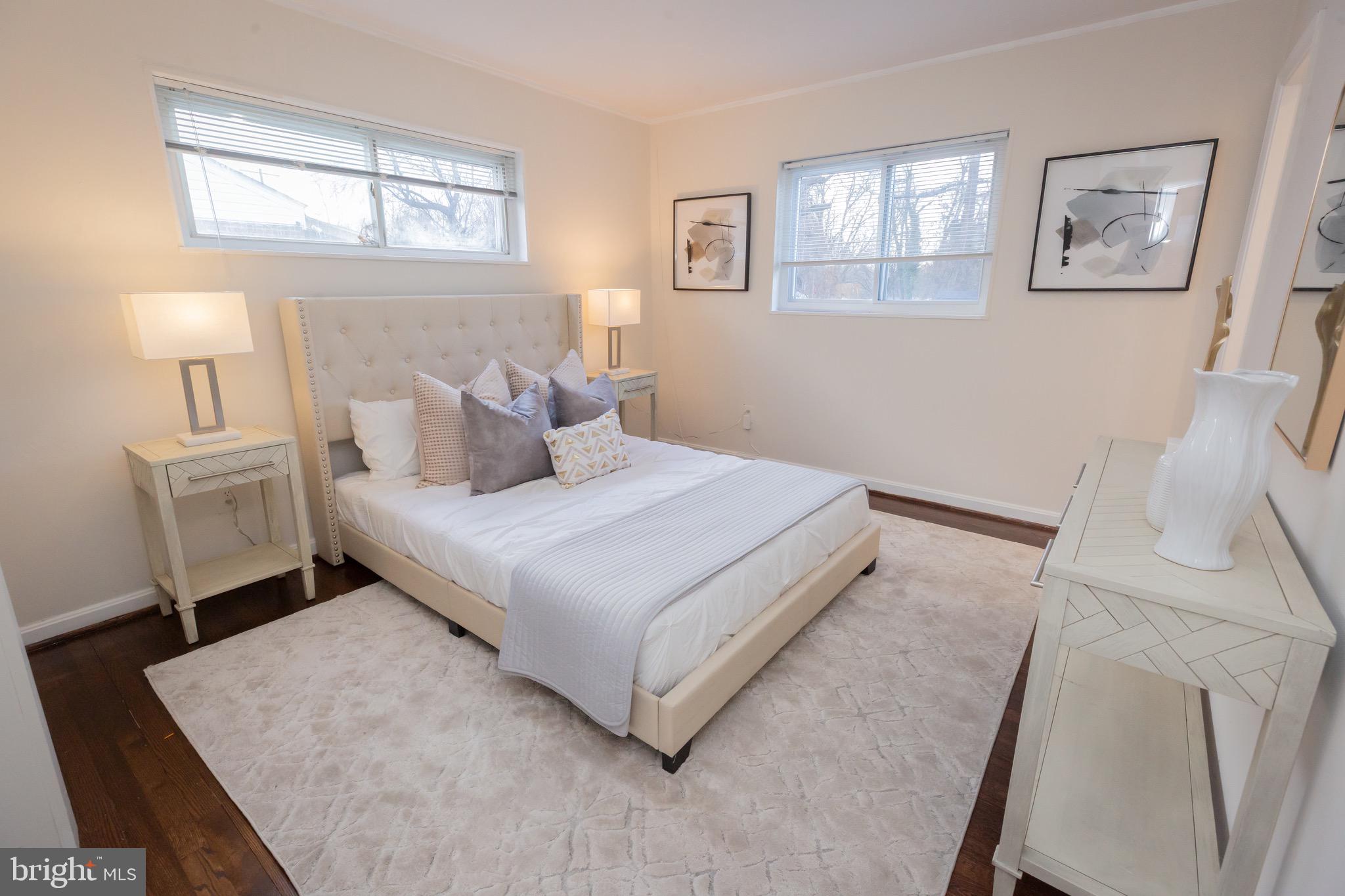 3945 Wendy Lane Silver Spring, MD 20906 - Photo 12 of 45 a bedroom with a bed and window