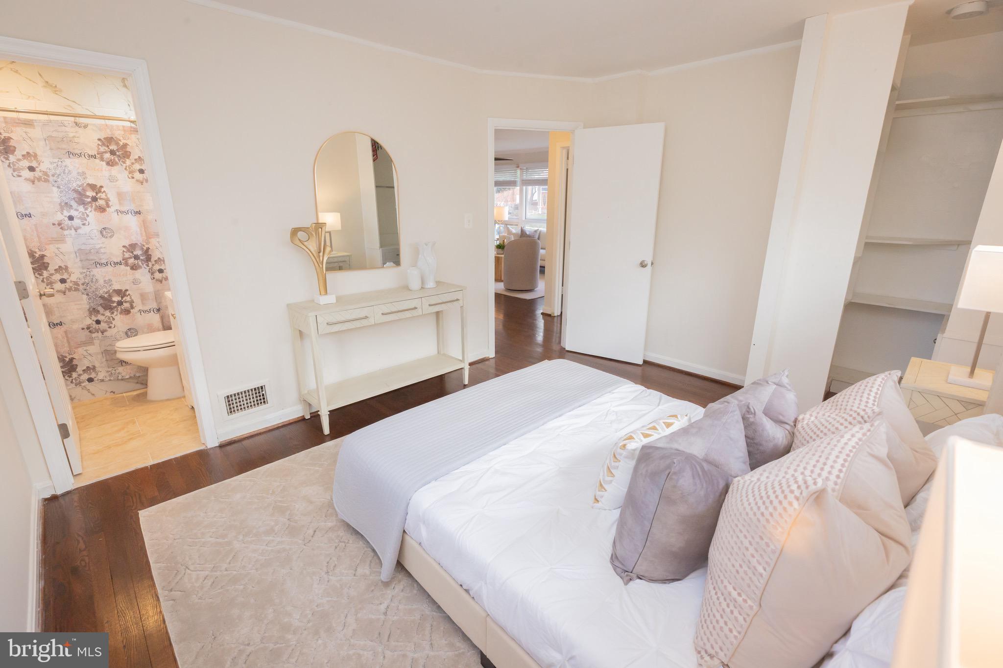 3945 Wendy Lane Silver Spring, MD 20906 - Photo 15 of 45 a bedroom with a bed and a dresser