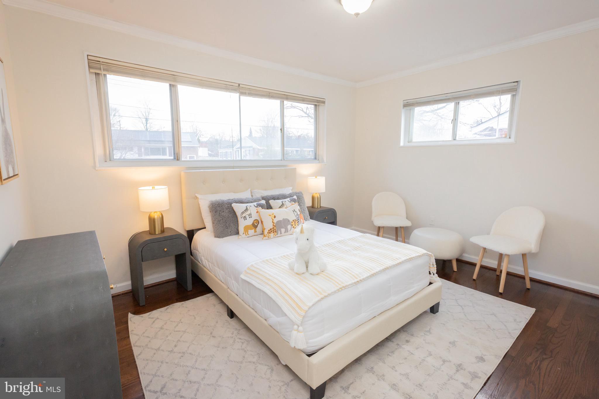 3945 Wendy Lane Silver Spring, MD 20906 - Photo 21 of 45 a bedroom with a bed and a large window