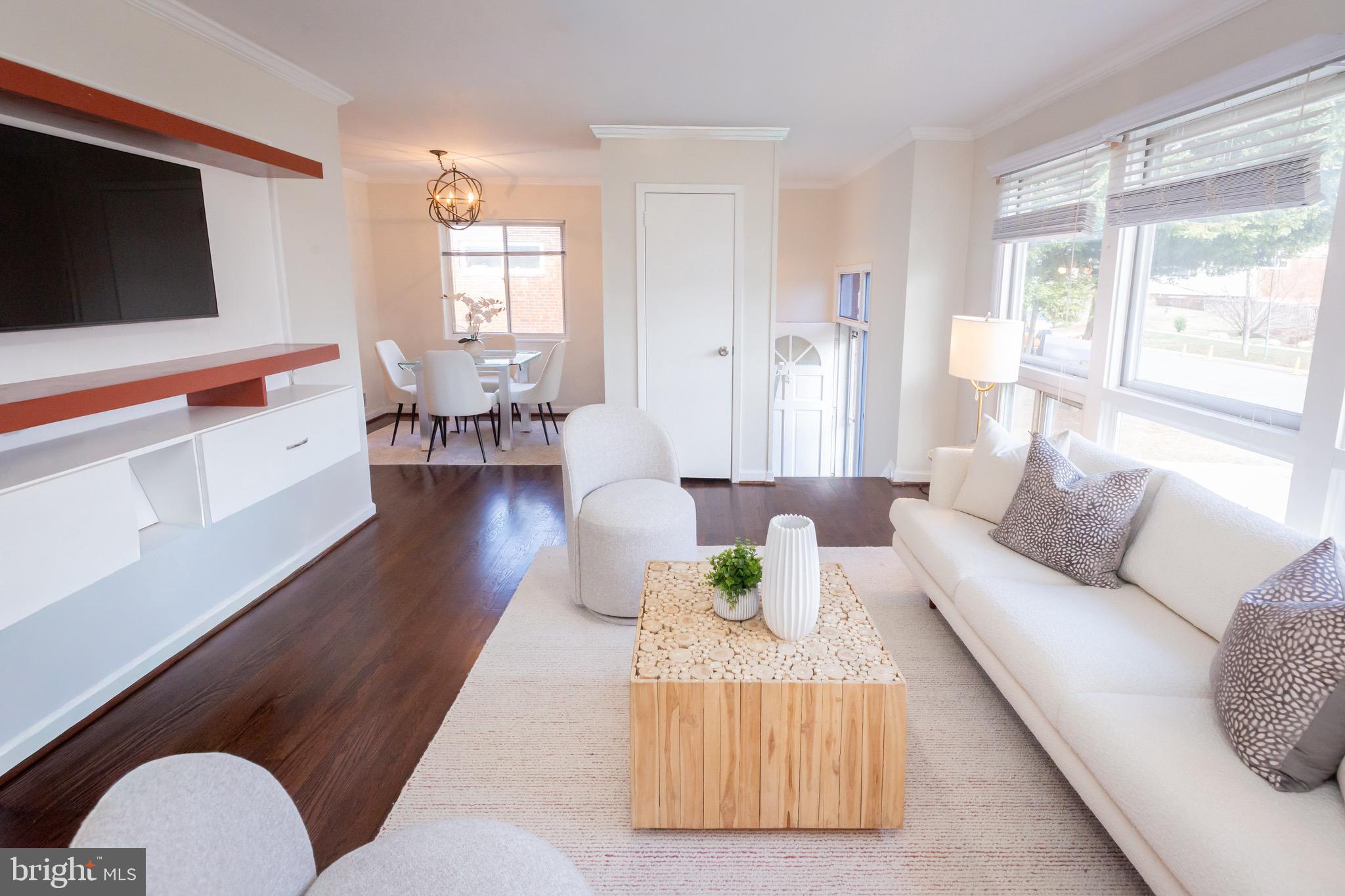 3945 Wendy Lane Silver Spring, MD 20906 - Photo 3 of 45 a living room with furniture and a flat screen tv