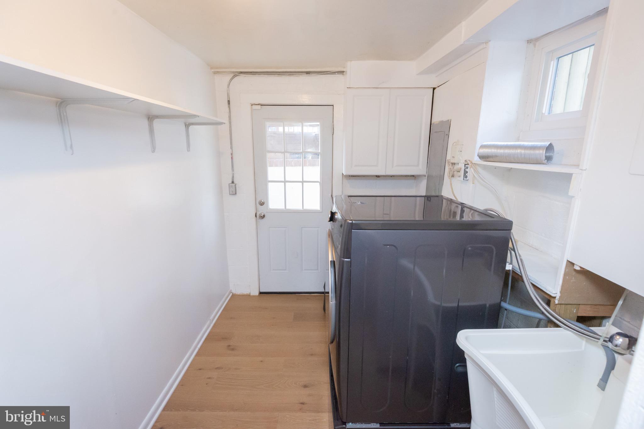 3945 Wendy Lane Silver Spring, MD 20906 - Photo 31 of 45 a bathroom with a sink toilet and mirror