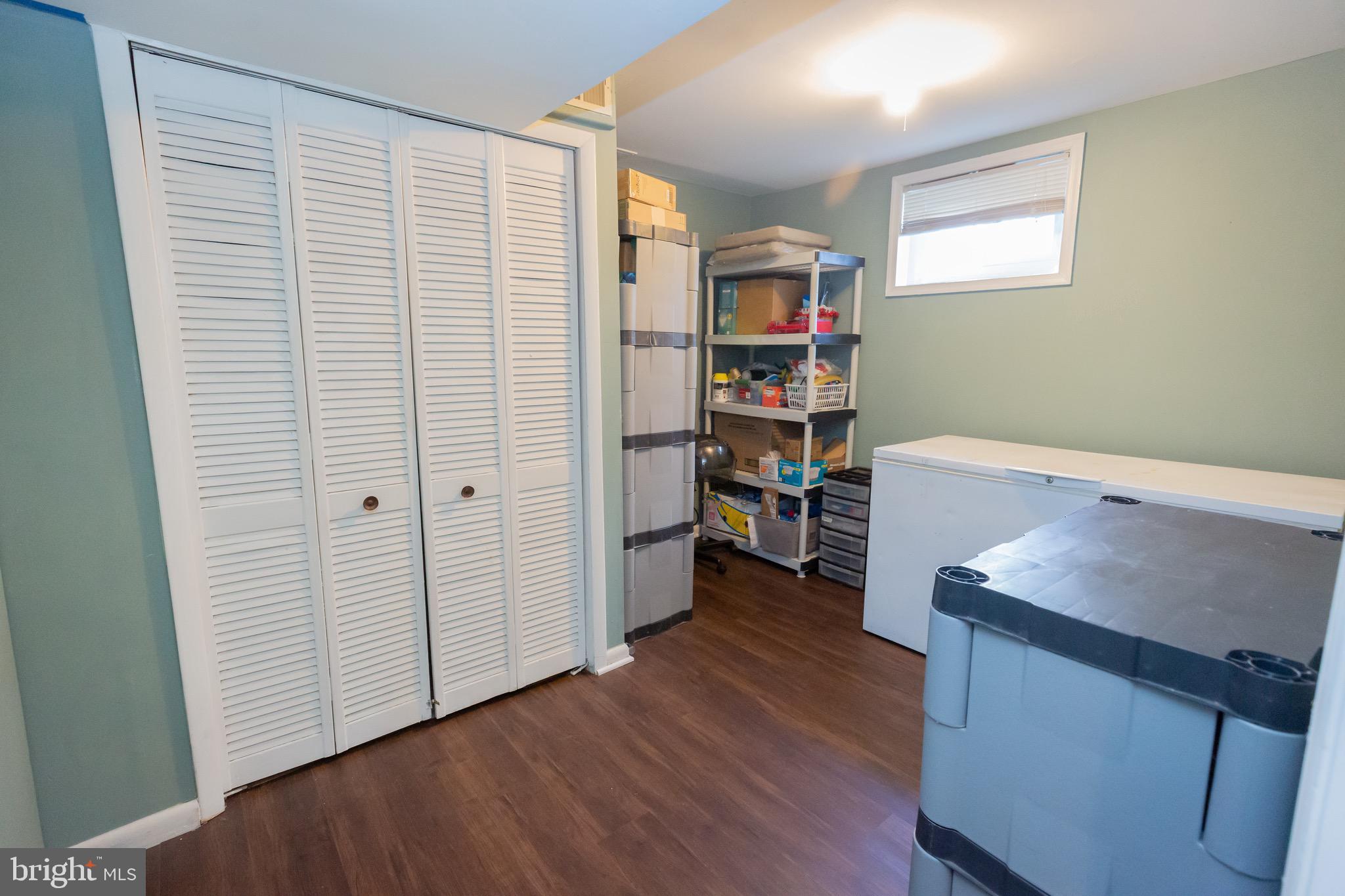 3945 Wendy Lane Silver Spring, MD 20906 - Photo 33 of 45 a view of a workspace with furniture and wooden floor