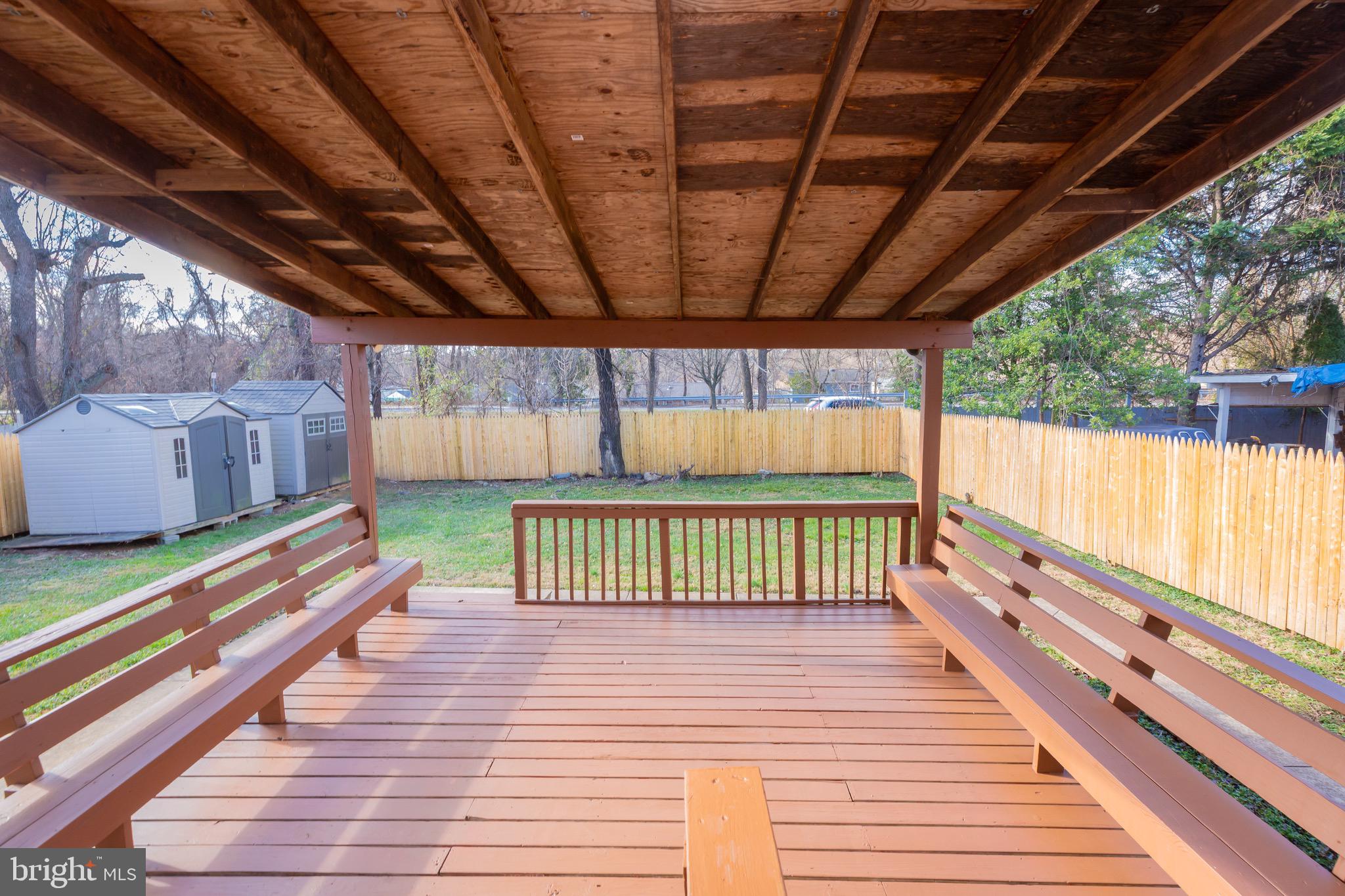 3945 Wendy Lane Silver Spring, MD 20906 - Photo 38 of 45 a view of a backyard with a wooden deck