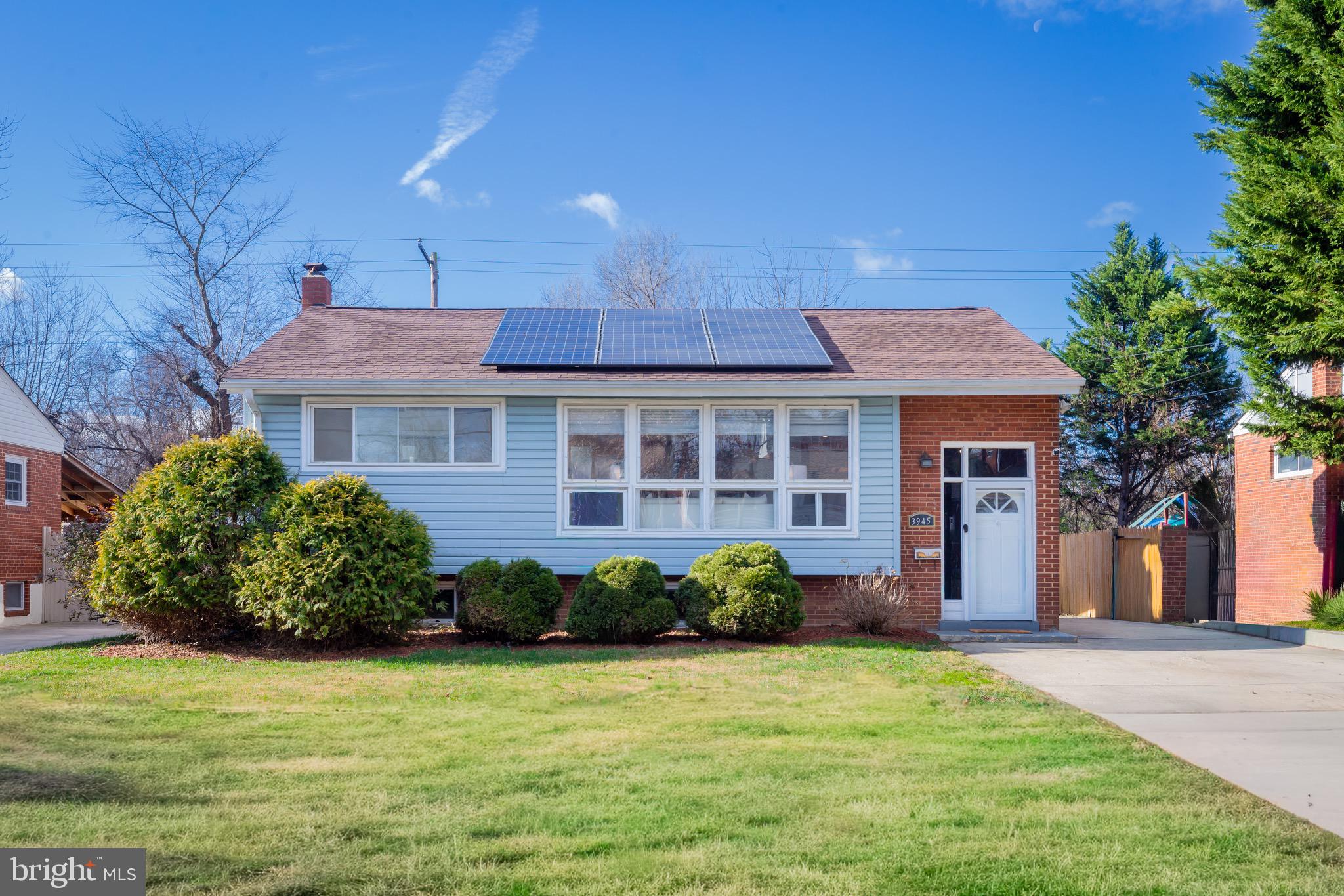 3945 Wendy Lane Silver Spring, MD 20906 - Photo 42 of 45 a front view of a house with garden