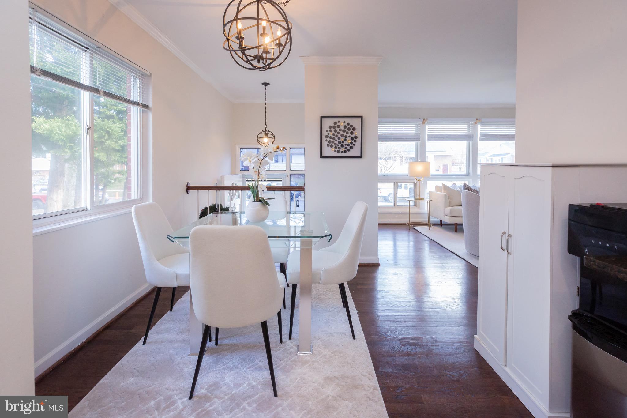 3945 Wendy Lane Silver Spring, MD 20906 - Photo 5 of 45 a view of a dining room with furniture window and wooden floor