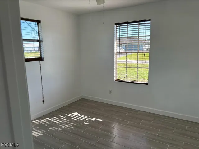 an empty room with windows