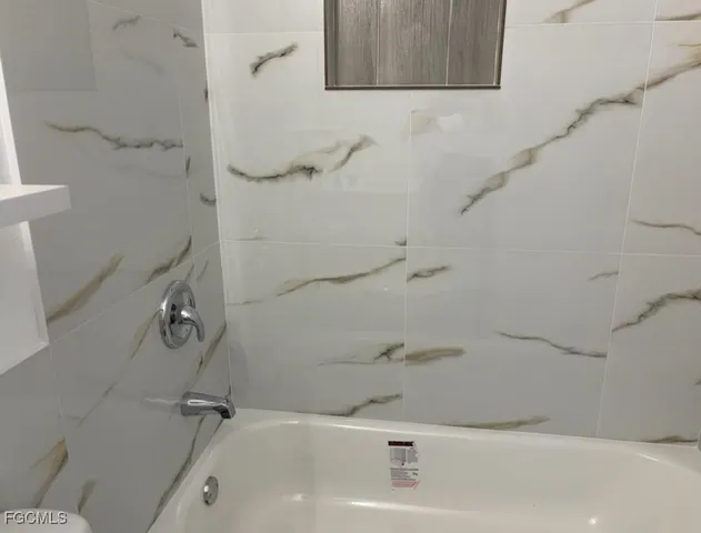 a bathroom with a bathtub