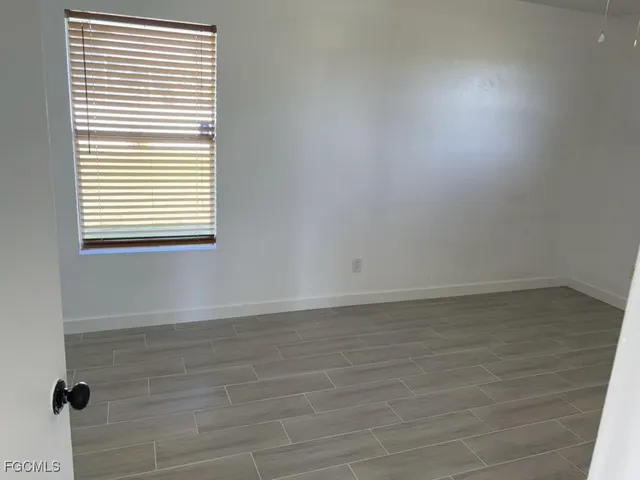 a view of a room that has a window in it