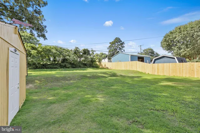 a view of a house with a big yard