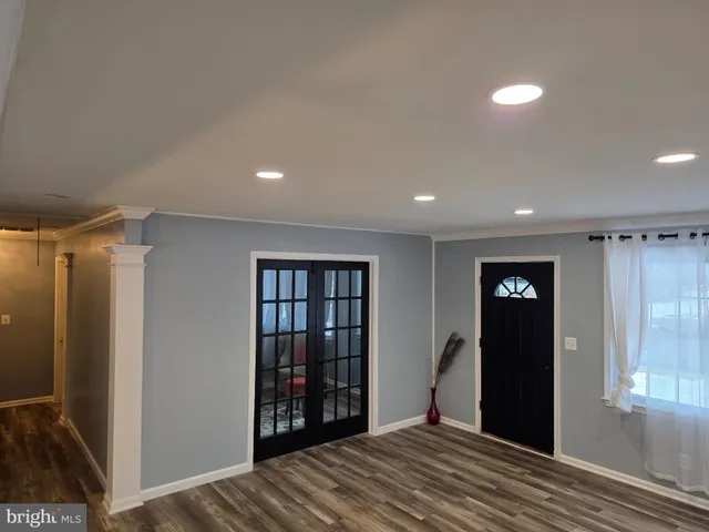 a view of a bedroom with closet area