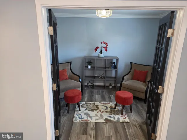 a living room with furniture and a couch