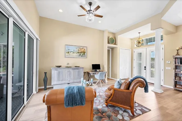 a living room with furniture and a window