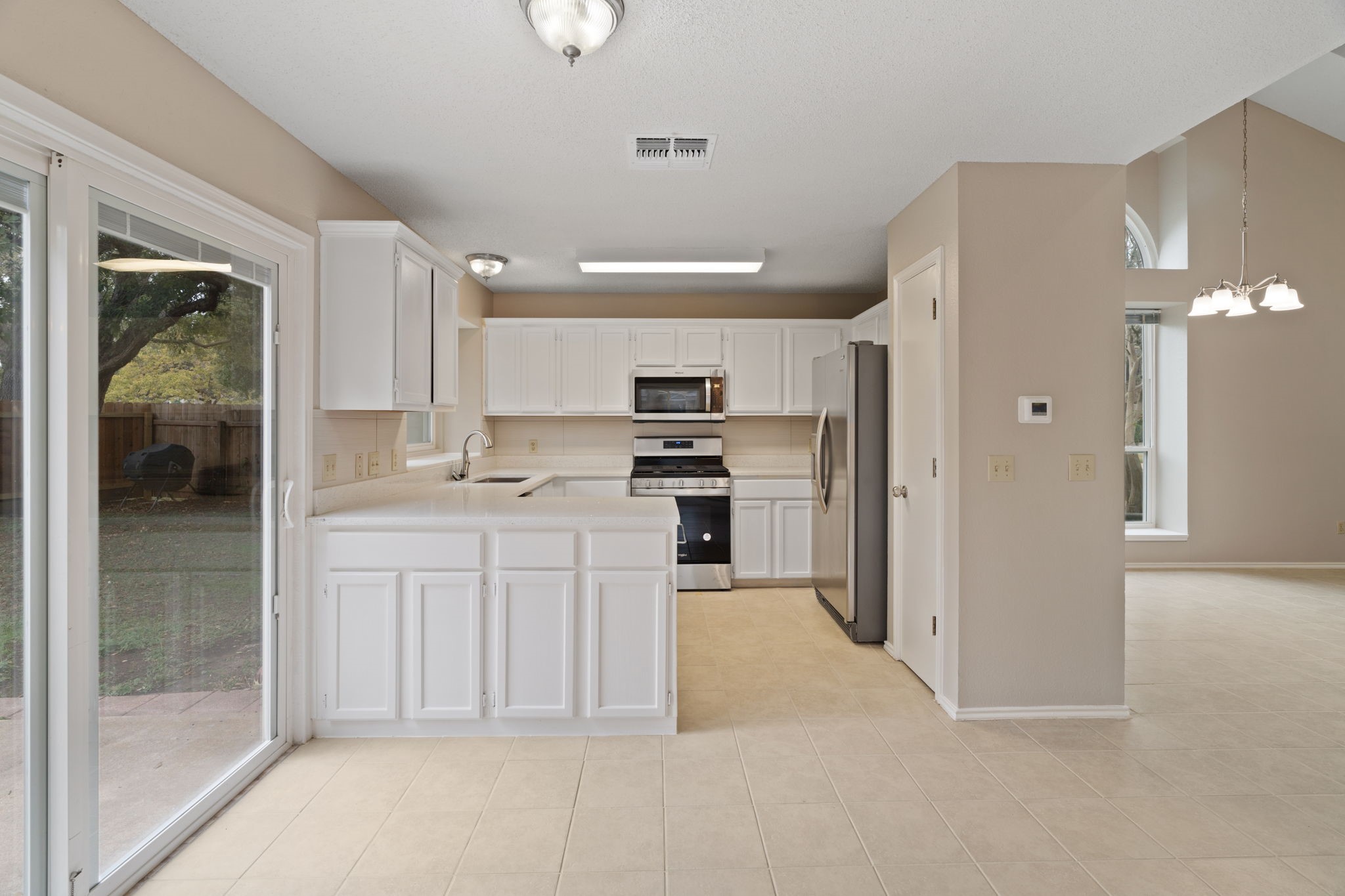 11600 Gun Powder Court Austin, TX 78748 - Photo 11 of 40 Broad View of Kitchen. Total Kitchen Update June 2025 With New Appliances & Quartz Countertops.