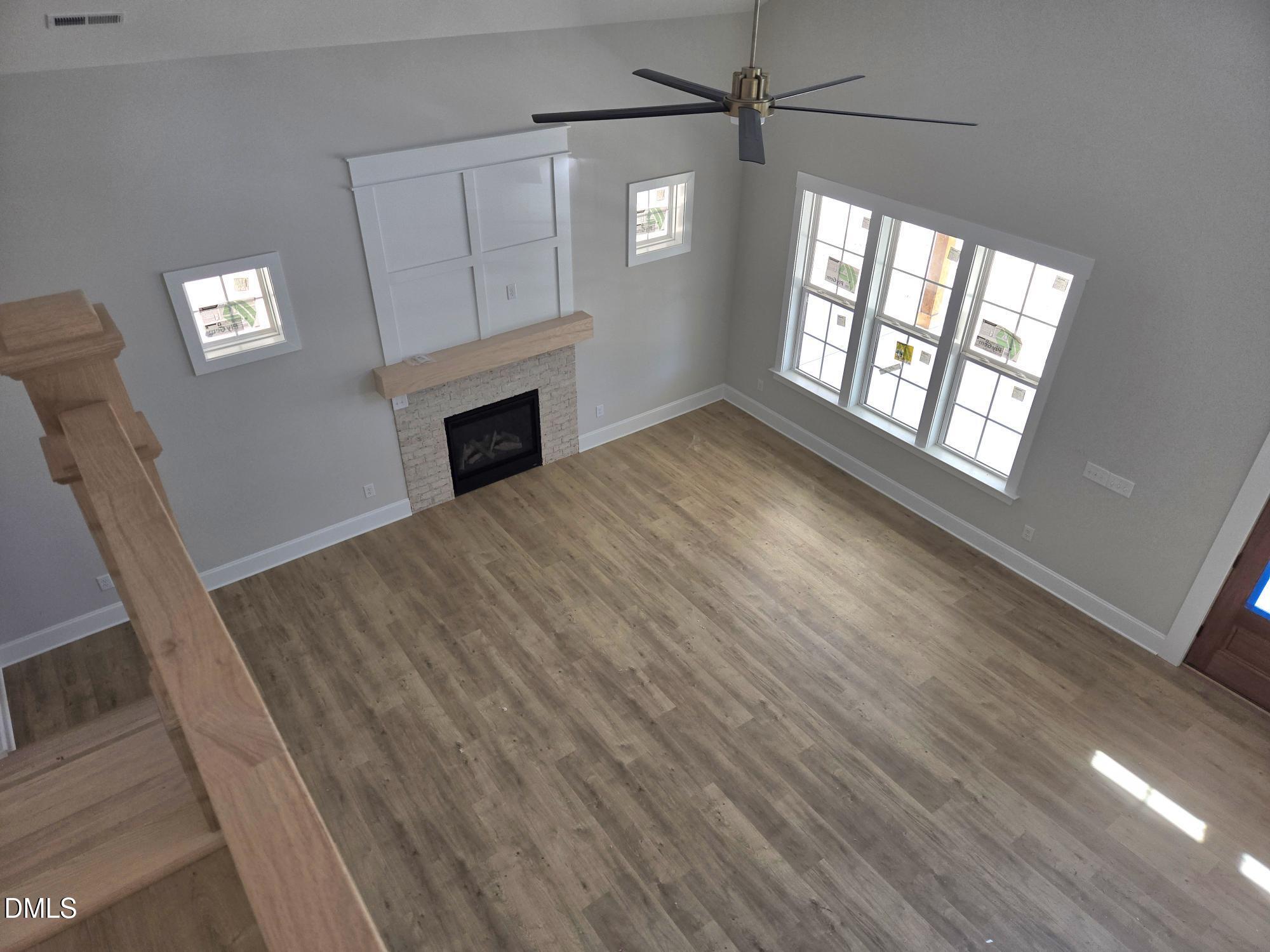 300 Avery Road Erwin, NC 28339 - Photo 7 of 38 a view of empty room with wooden floor and fan