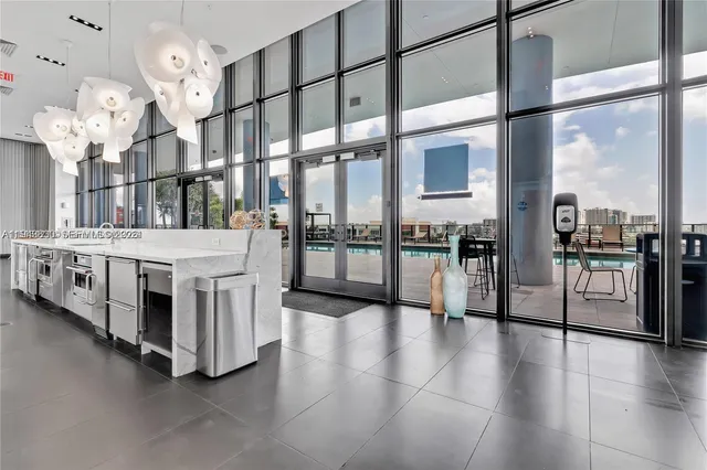 a view of a living room and entry way