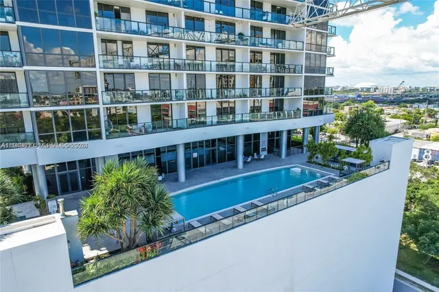 a view of a building with a garden