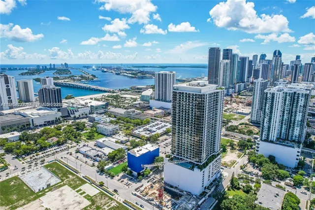 a view of a city with tall buildings
