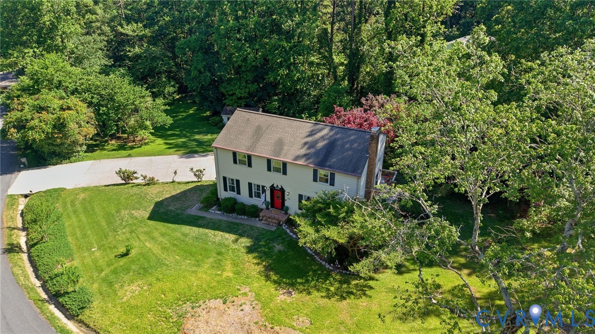 11200 Surry Road Chester, VA 23831 - Photo 47 of 48 an aerial view of a house with swimming pool and large trees