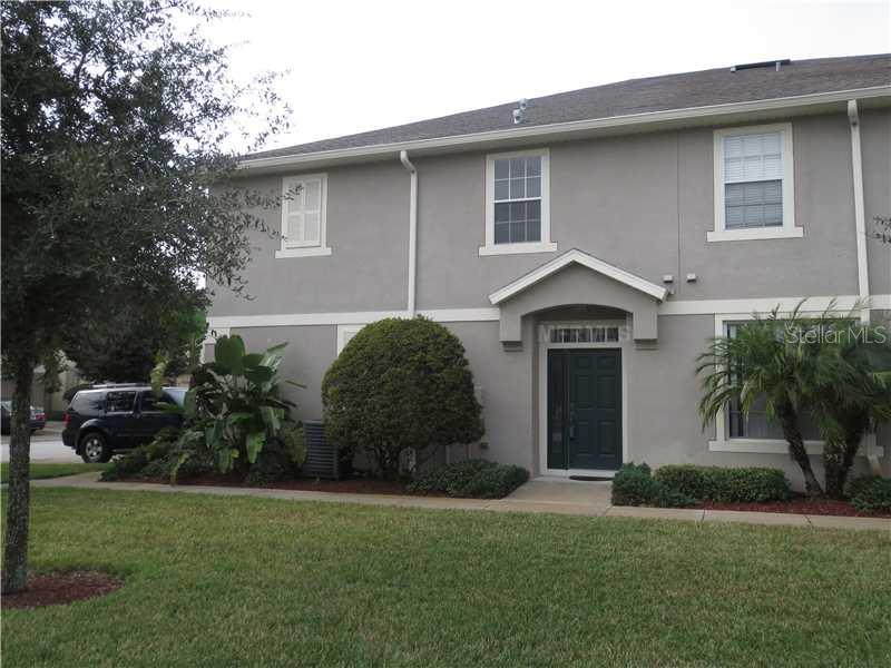 27802 Pleasure Ride Loop Wesley Chapel, FL 33544 - Photo 1 of 1 a front view of a house with garden