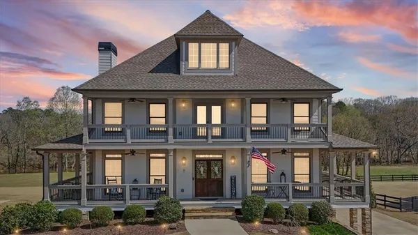 a view of a balcony with furniture