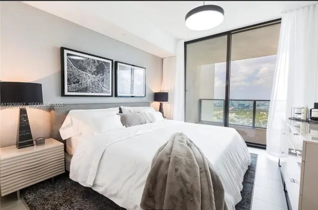 a outdoor space with patio furniture and a potted plant