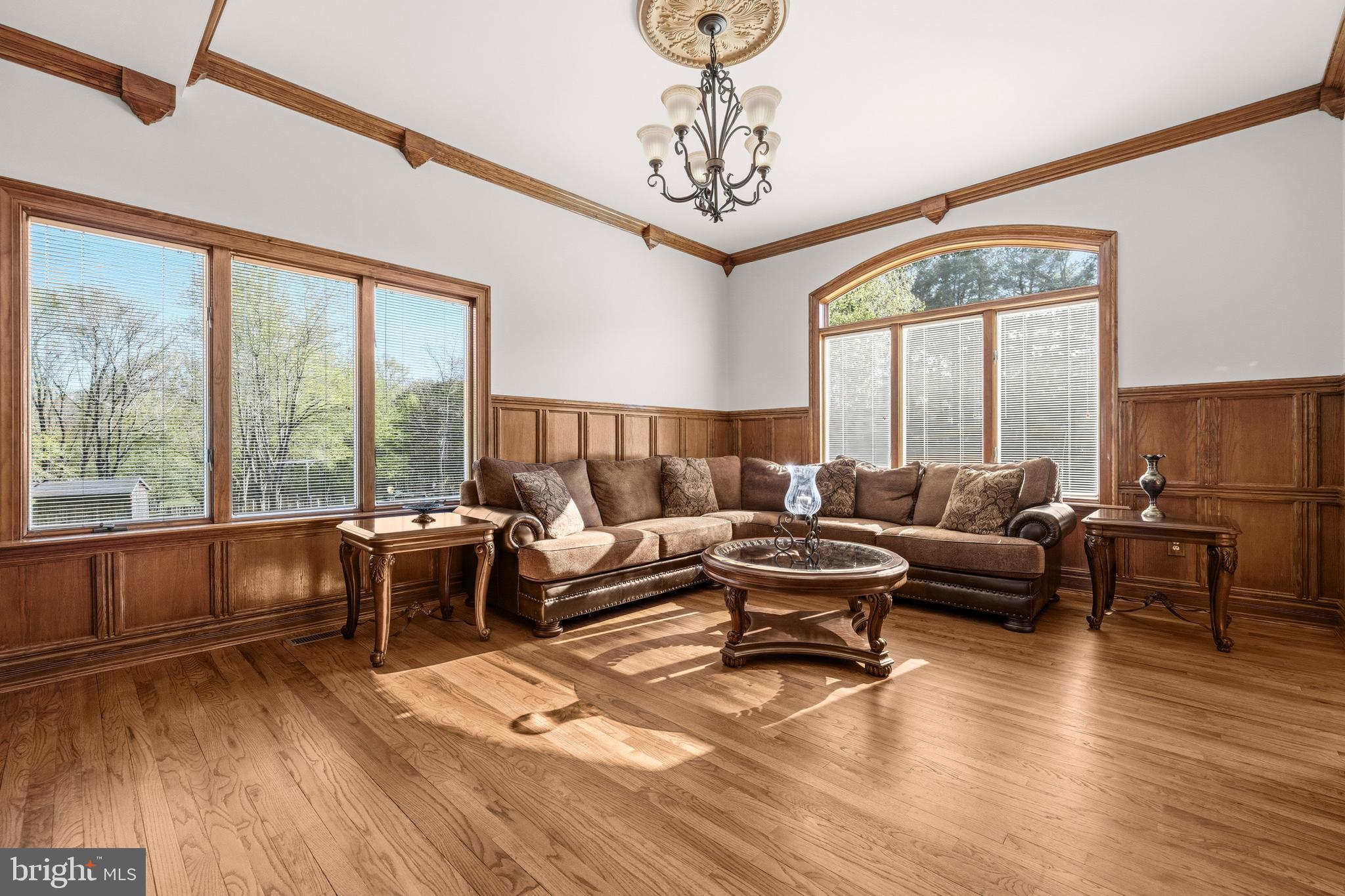 16170 Ed Warfield Road Woodbine, MD 21797 - Photo 15 of 80 a living room with furniture and a large window