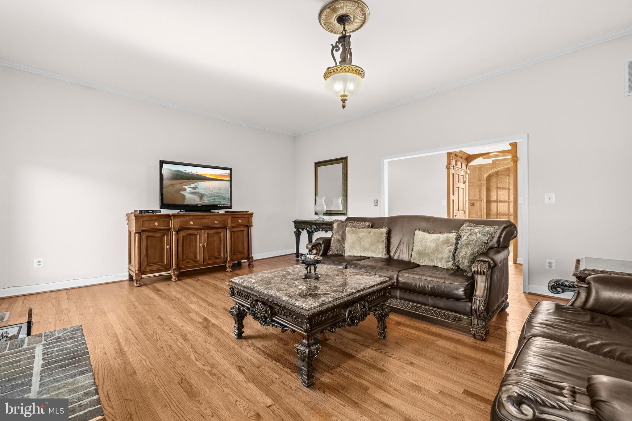 16170 Ed Warfield Road Woodbine, MD 21797 - Photo 21 of 80 a living room with furniture and a flat screen tv